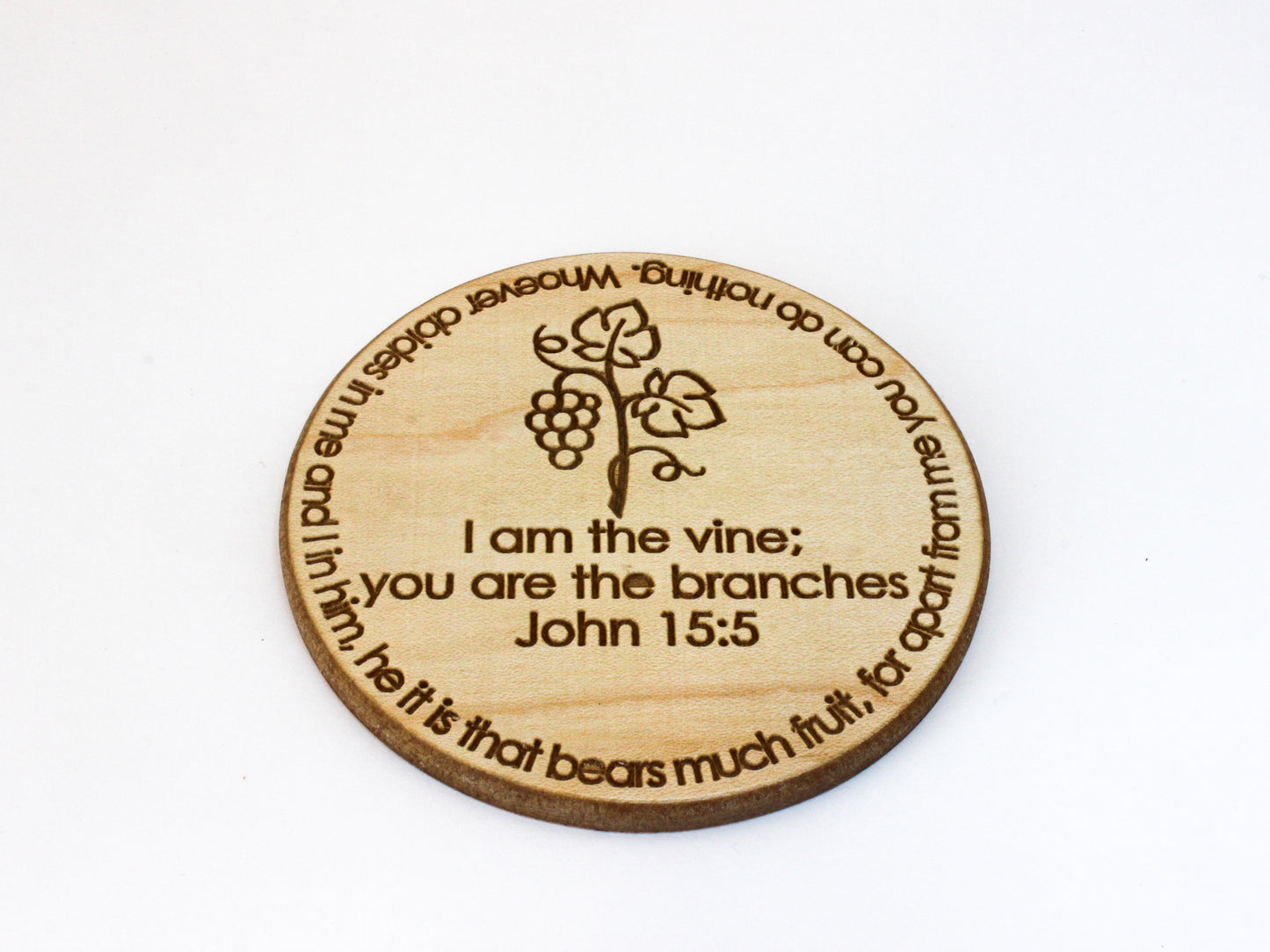 Wooden coaster engraved with image of grape vine and featuring the text of John 15:5: "I am the vine; you are the branches. Whoever abides in me and I in him, he it is that bears much fruit, for apart from me you can do nothing."