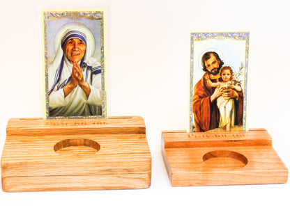 Wooden holy card stand with space for votive candle. Larger size includes space for storing small stack of prayer cards