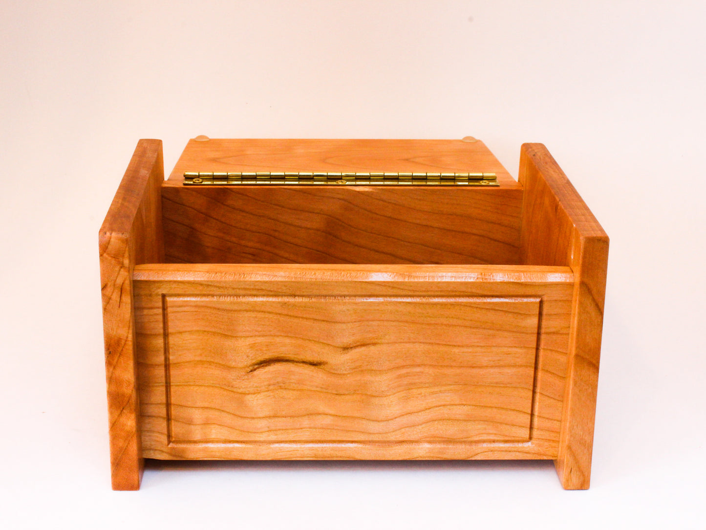 Front view of wooden keepsake box with hinged lid open 