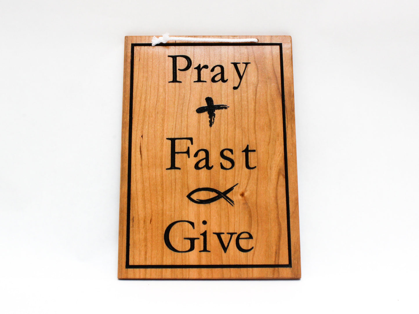 Reversible Lenten hanging sign featuring the text Pray Fast Give with images of the Ash Wednesday cross and the fasting fish. Catholic Lenten decorative sign.